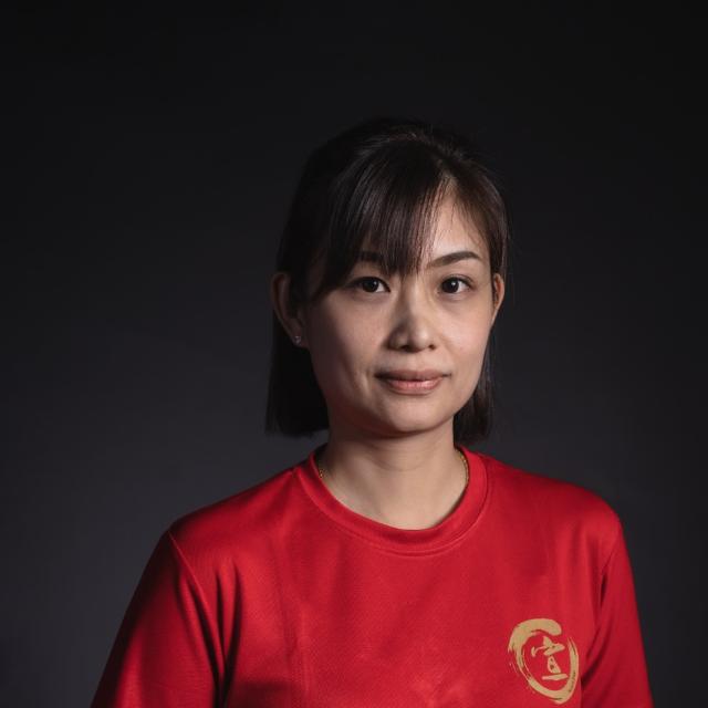 Coach Jennee, a World Wushu Championship silver medalist in Taiji, combines her competitive excellence with a warm and lively teaching style. Known for her cheerful personality and disciplined coaching, she has nurtured many champions and also guides students who practice Taiji for its health and wellness benefits.