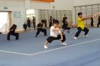 Coach Yan Ping (Wei Lun Sports School) teaching Xuan athletes despite expecting a baby