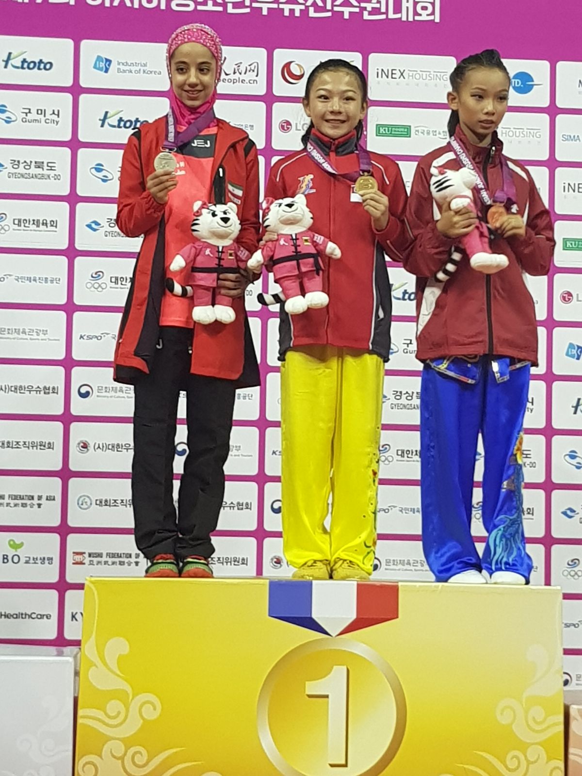An ecstatic Berlynn Ng on the podium
